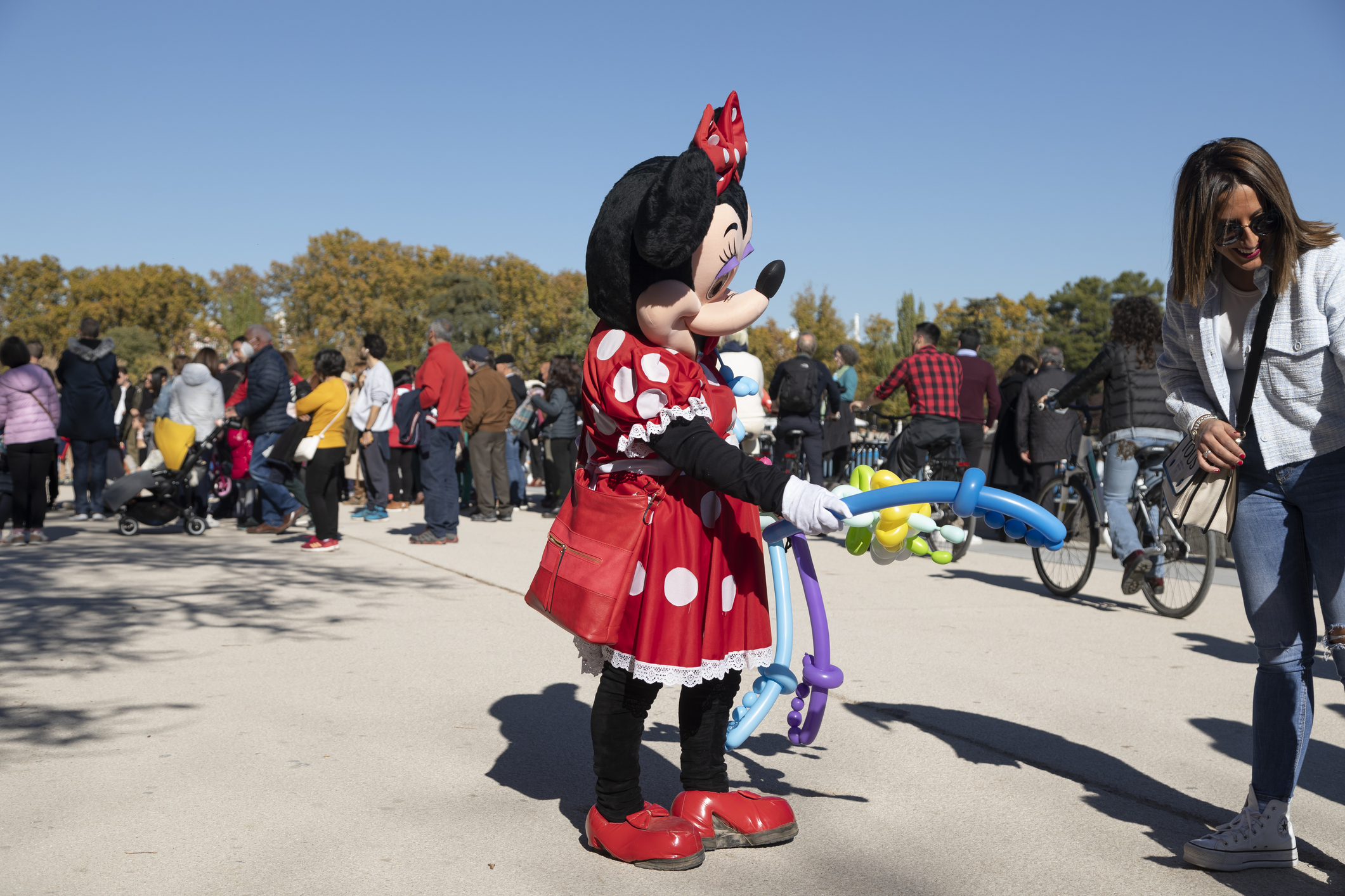 Entertainment worker dressed as Minnie Mouse by alvarobueno via iStock for WMNF News