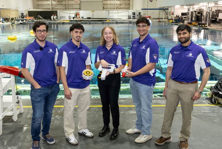 Florida Polytechnic Universitys AlbertX Team Displays The Innovative Tool It Designed For NASA’s Micro G NExT Challenge At Johnson Space Center In Houston